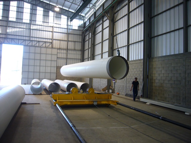 Coating large metal pipes for aqueducts